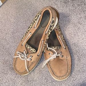 Woman’s leopard Sperry boat shoes